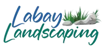 The logo for labay landscaping shows a rock with grass growing out of it.