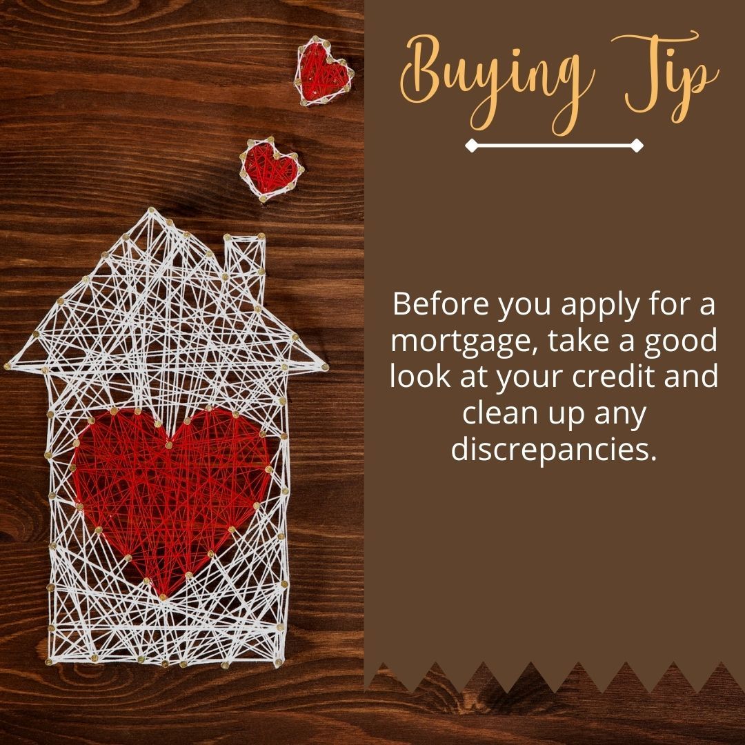 A house made of string with a heart inside of it.