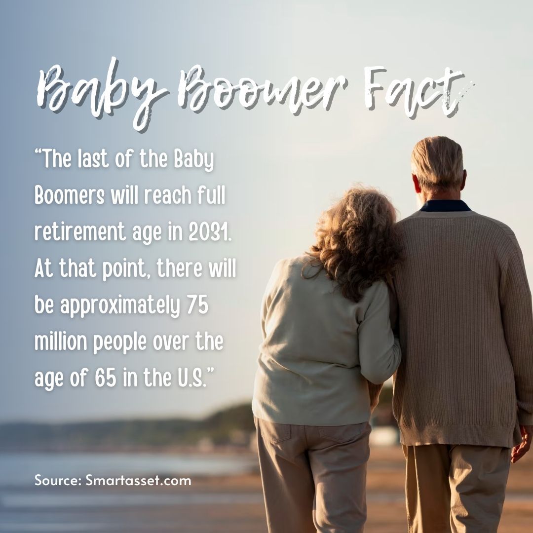 A couple walking on a beach with a baby boomer fact