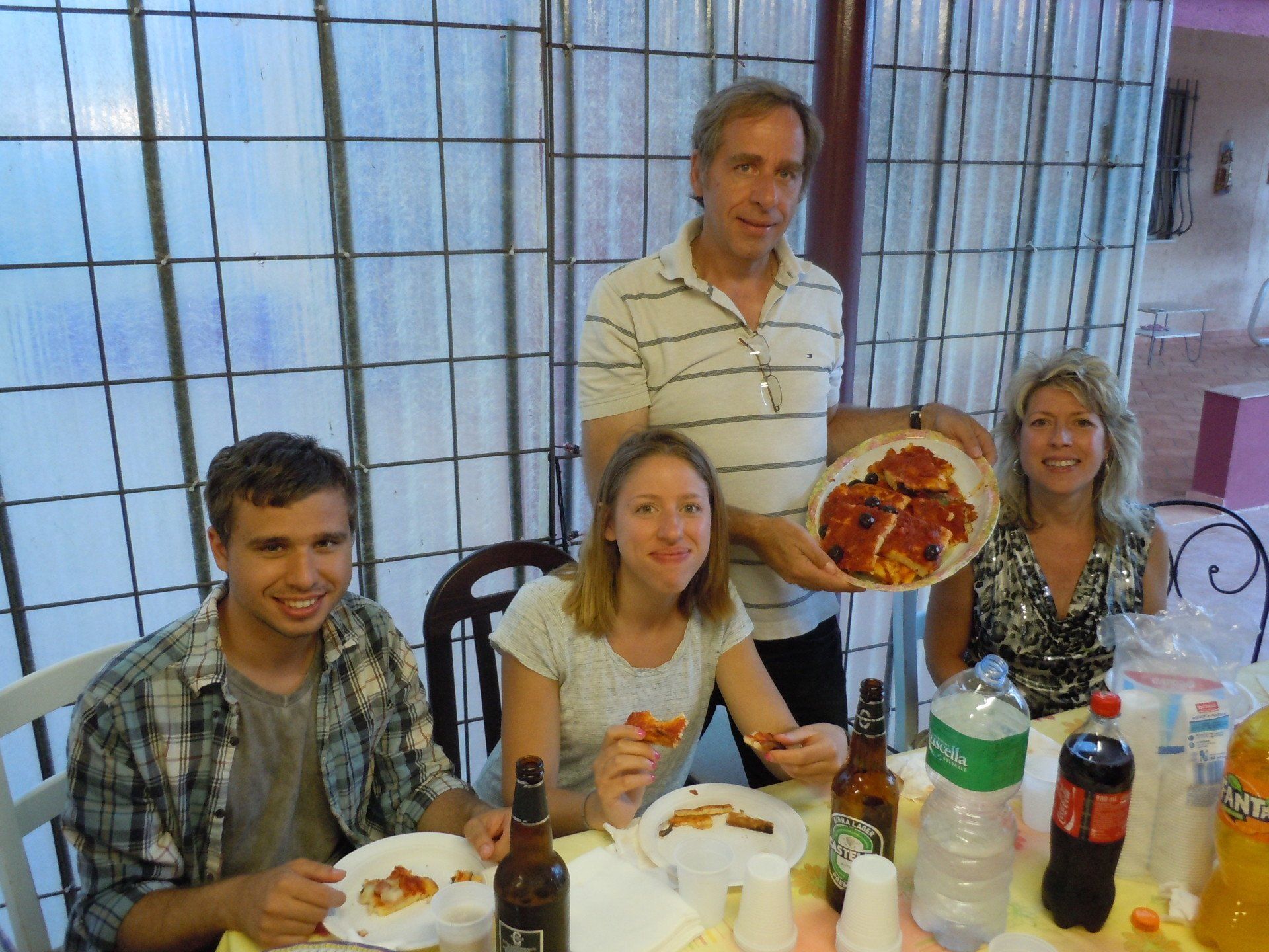 Mother Holding Her Baby While Cooking — Saddle Brook, NJ — Manor House Cabinetry