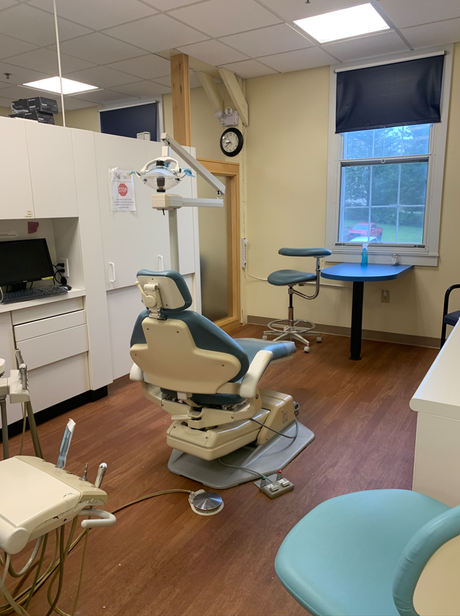 Professional dentist doing work — Brattleboro, VT — Estey Dental Center
