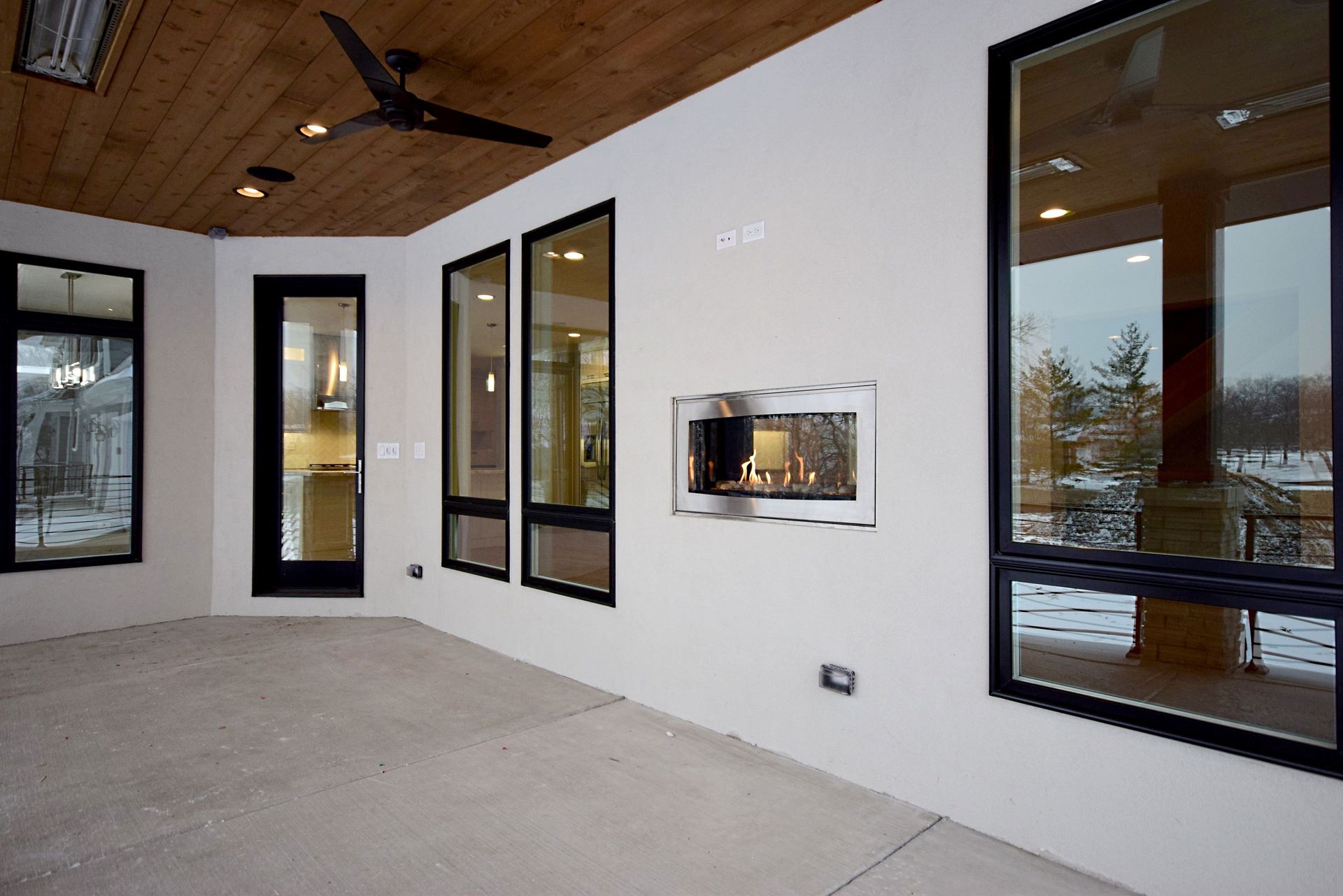 There is a fireplace in the middle of the room.