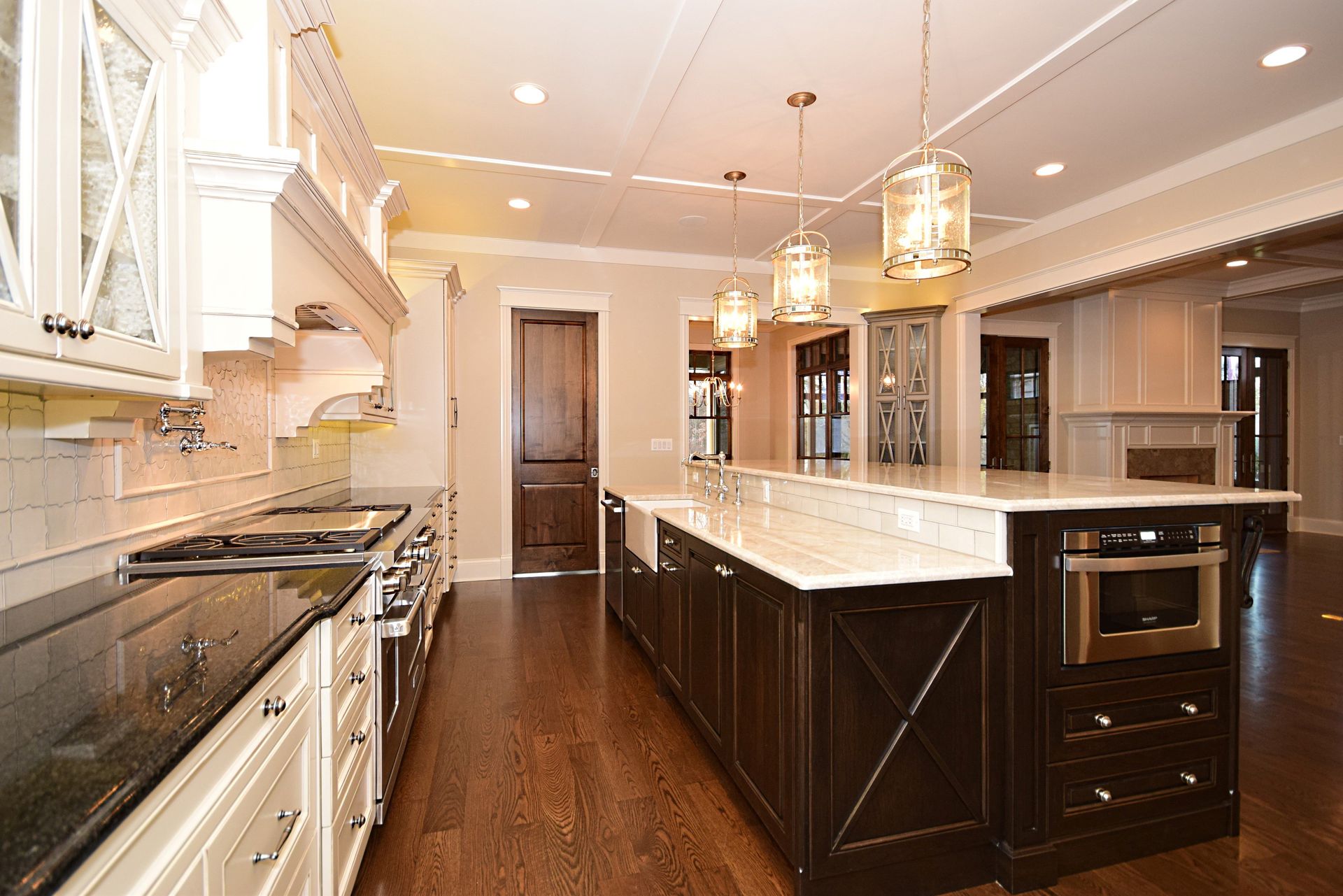 A kitchen with a large island in the middle of it.