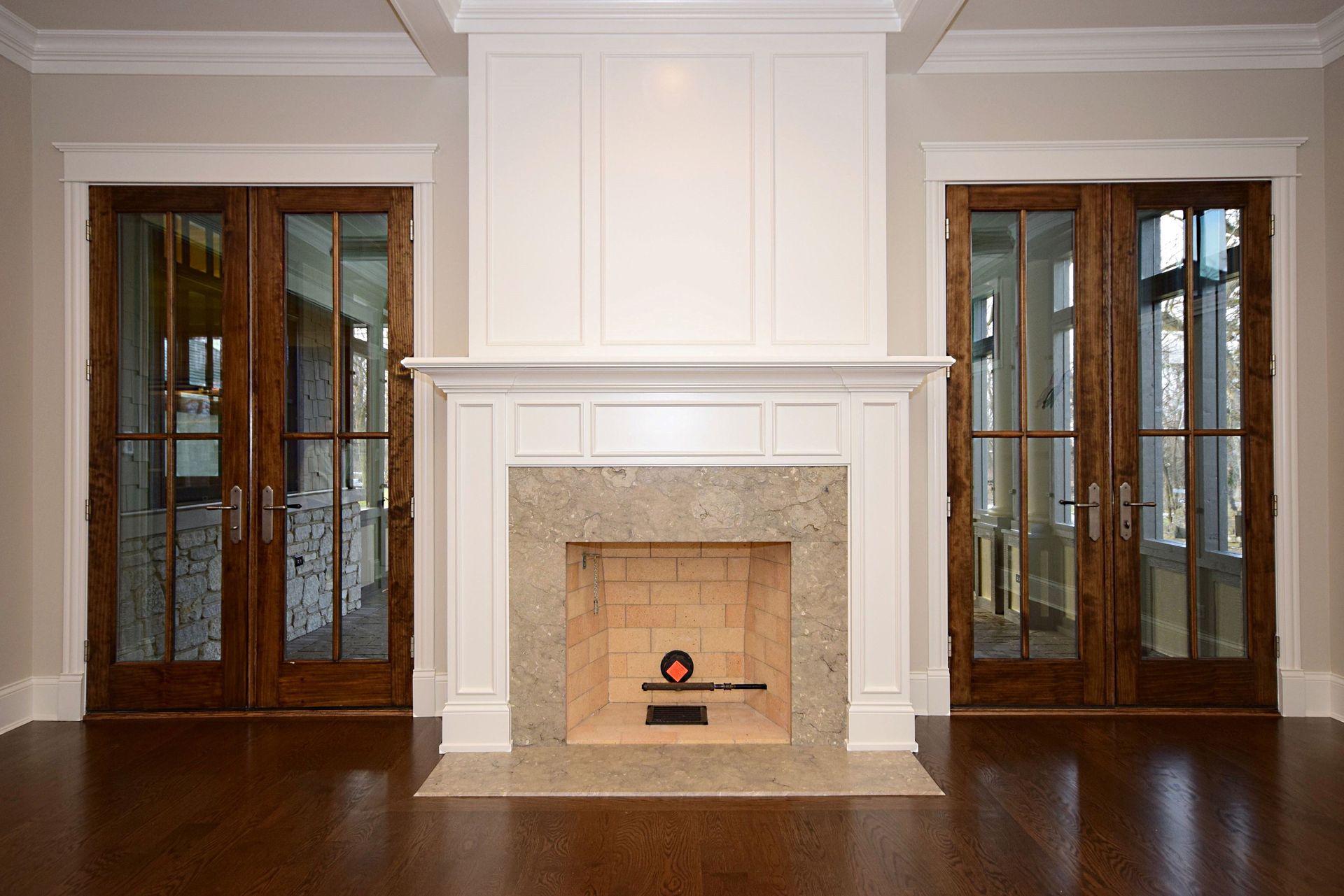 There is a fireplace in the middle of the room.