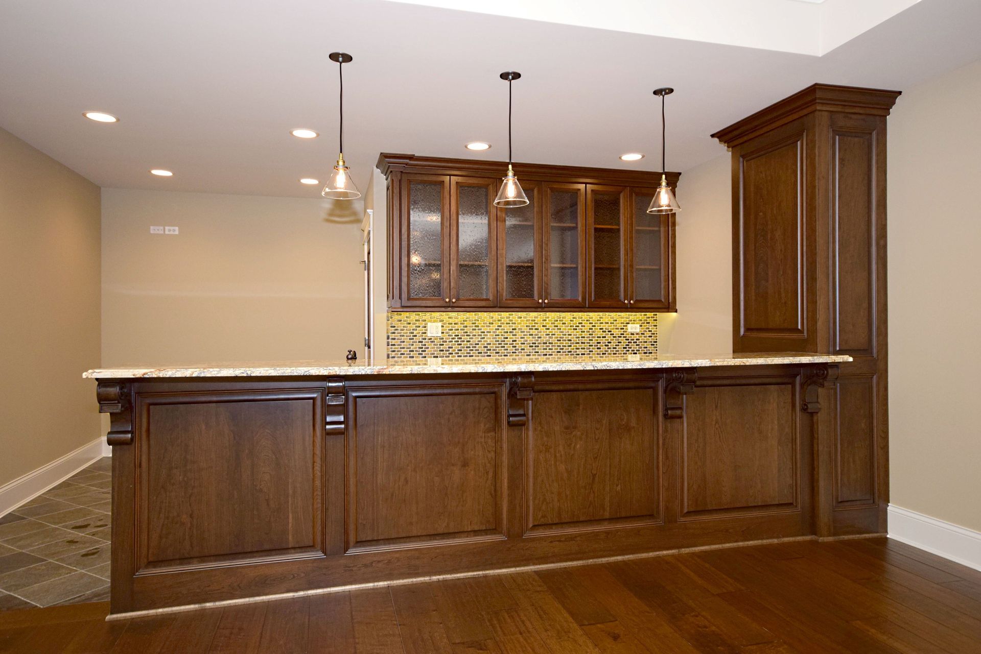 There is a bar in the middle of the room.