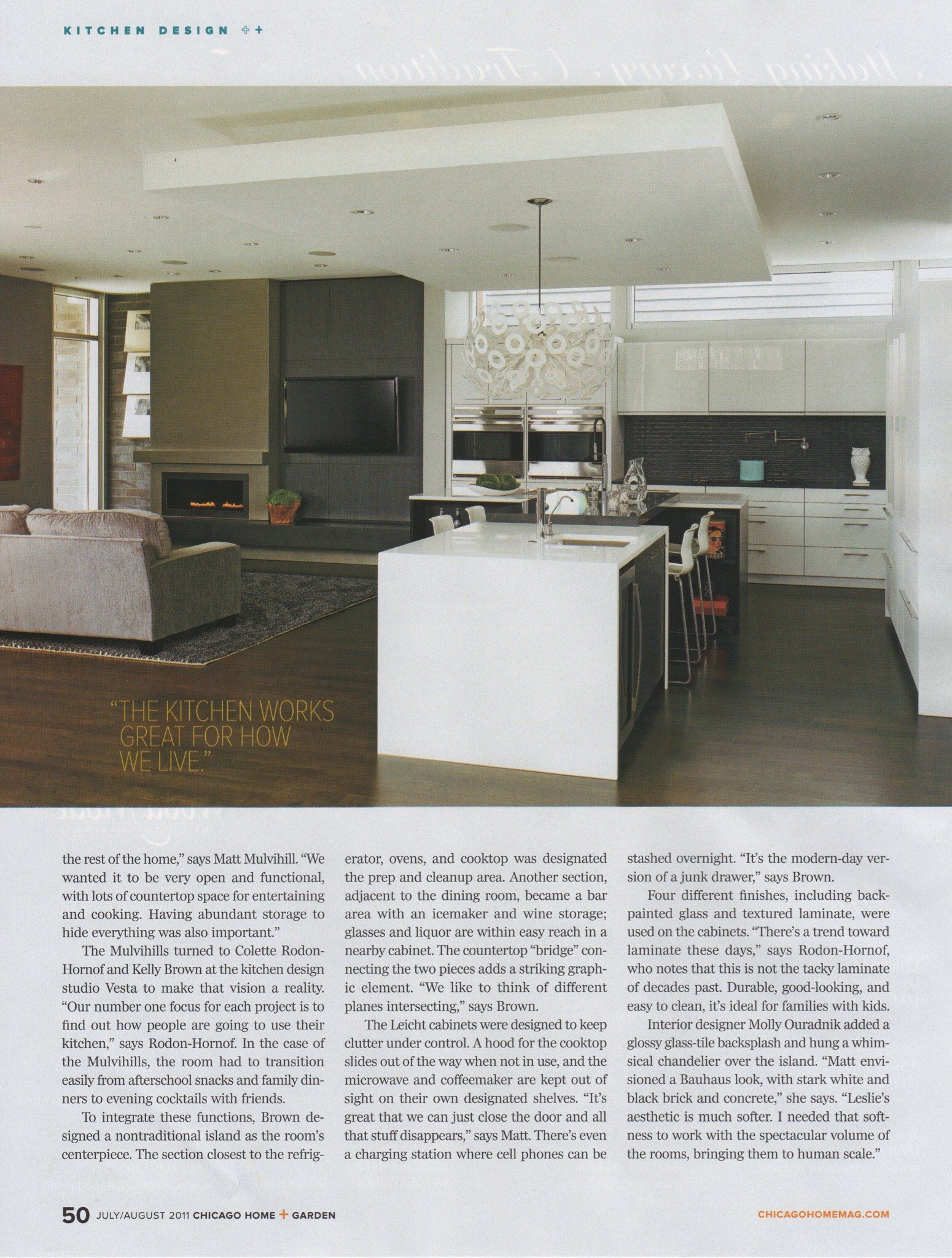 A picture of a living room and kitchen in a magazine