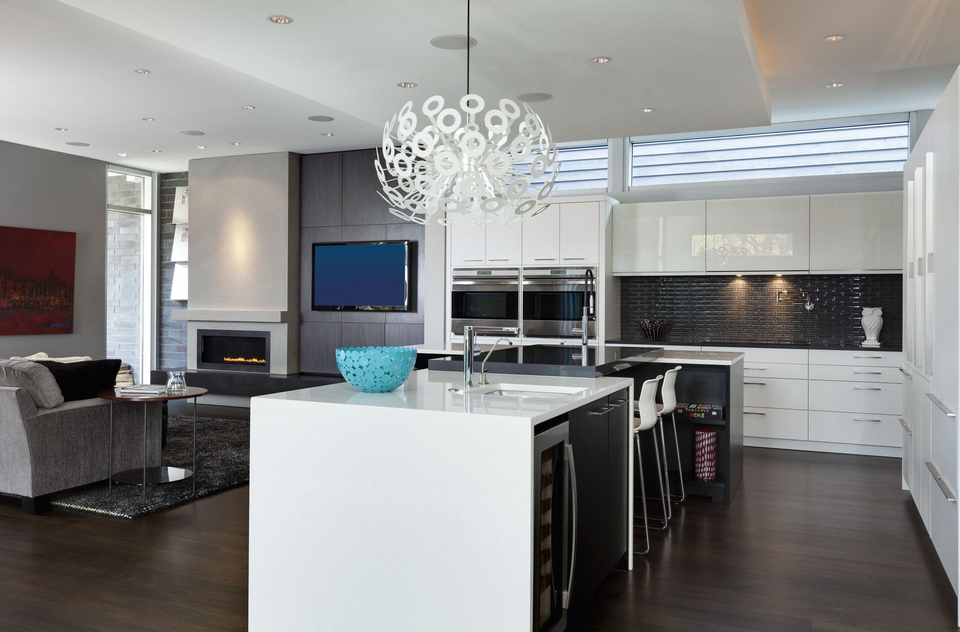 A kitchen with a large island in the middle of it