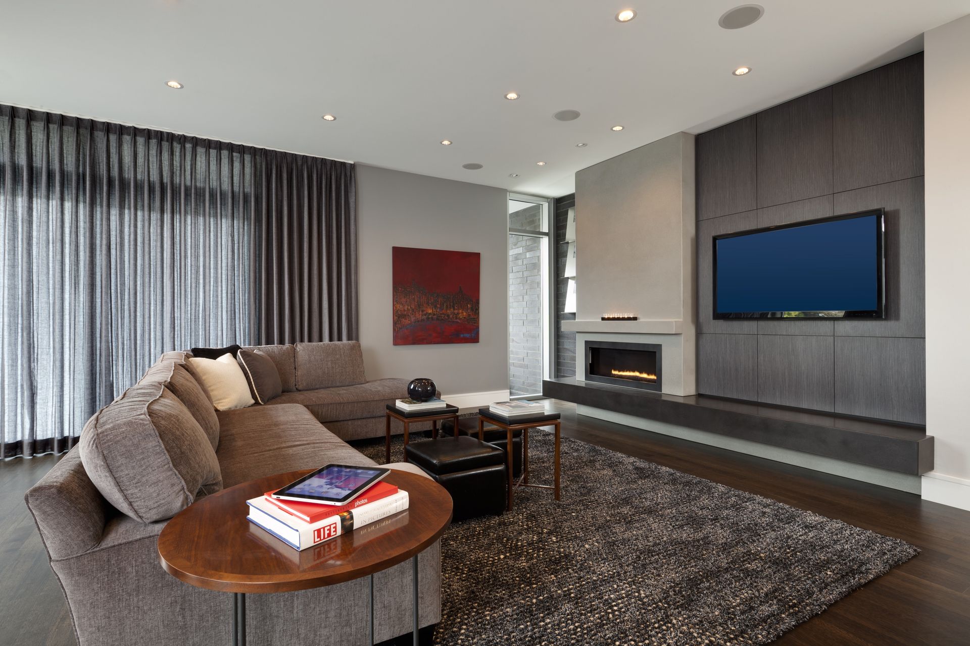 A living room with a couch and a flat screen tv