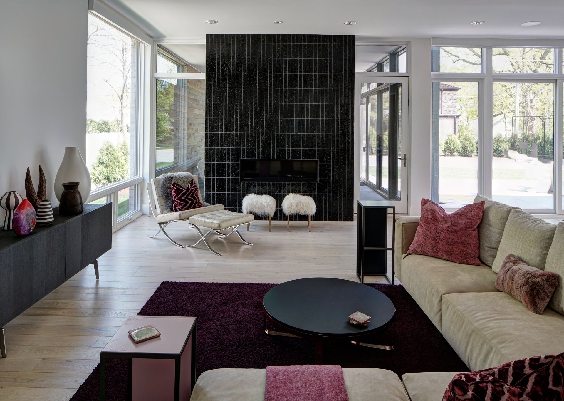 A living room filled with furniture and a fireplace.