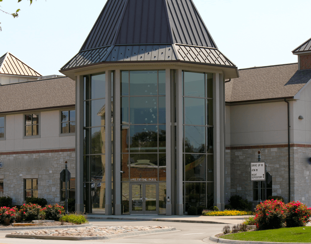 A large building with a dome roof and a lot of windows