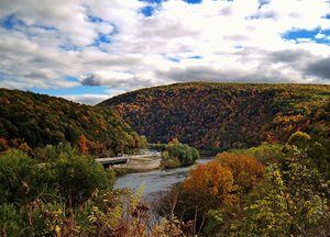 Peaceful valley with a river running through it