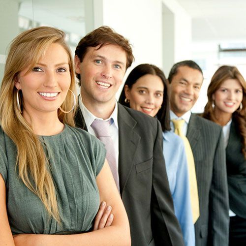 A group of people posing for a picture with their arms crossed