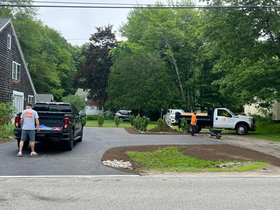 Crew at work hardscaping with Select Sealcoating & Paving