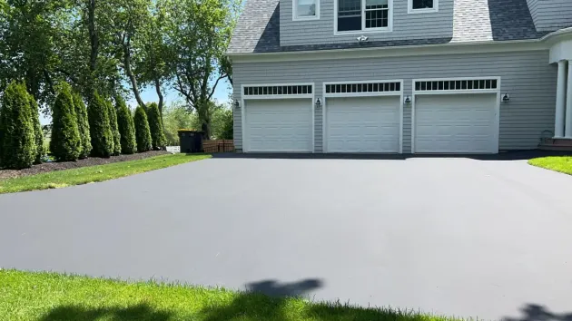 Home Sealcoating Driveway by Select Sealcoating in Southern Maine