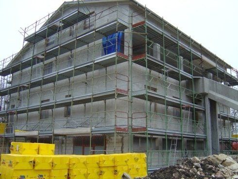 Opera di coibentazione su edificio