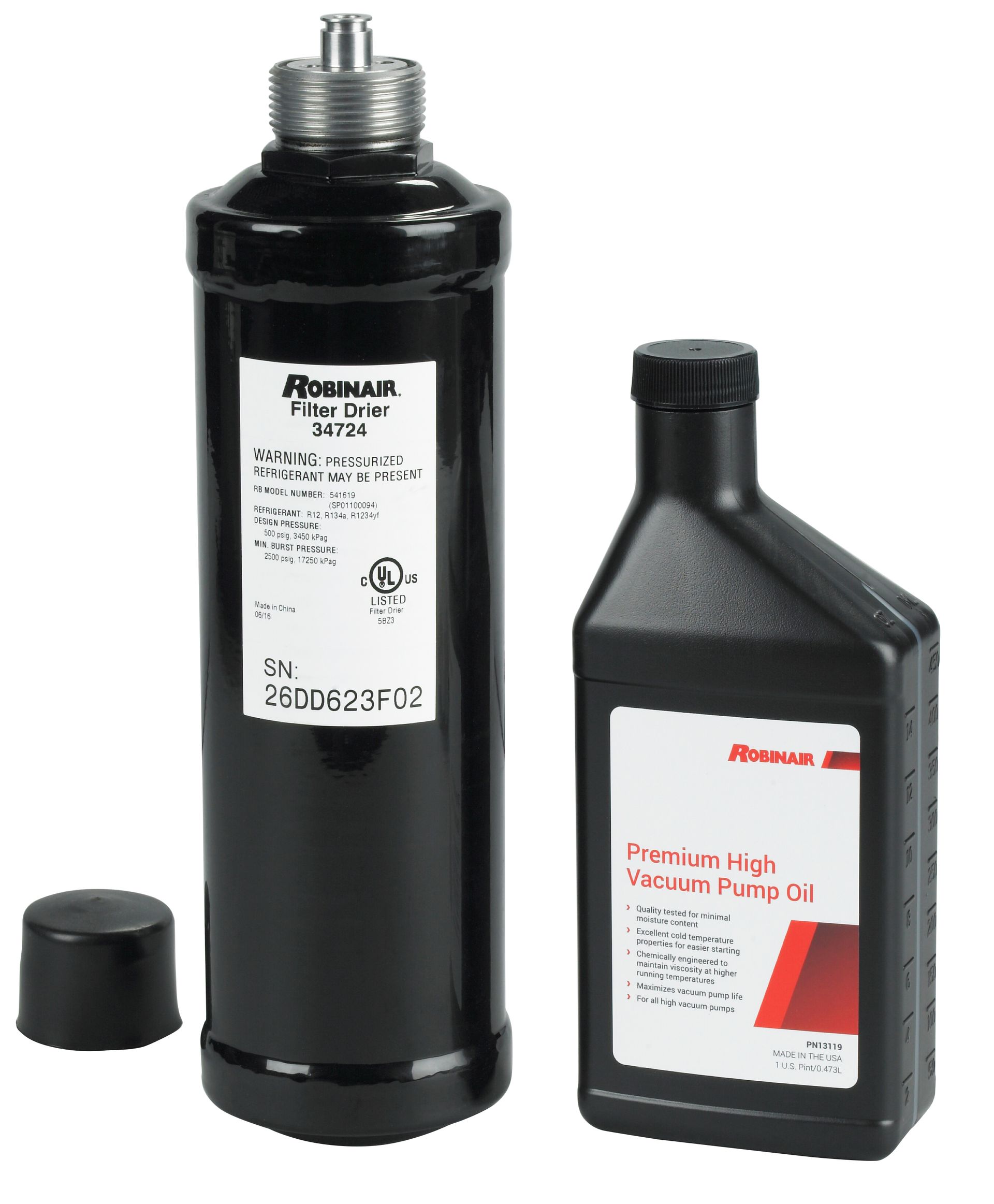 Voiture sur un pont élévateur dans un garage avec des outils et de l'équipement.