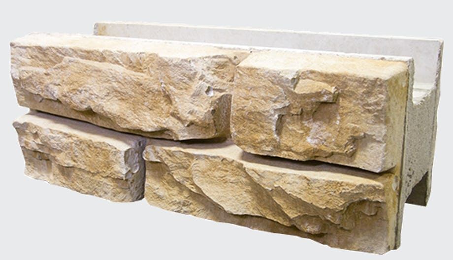 A close up of a stone wall on a white background