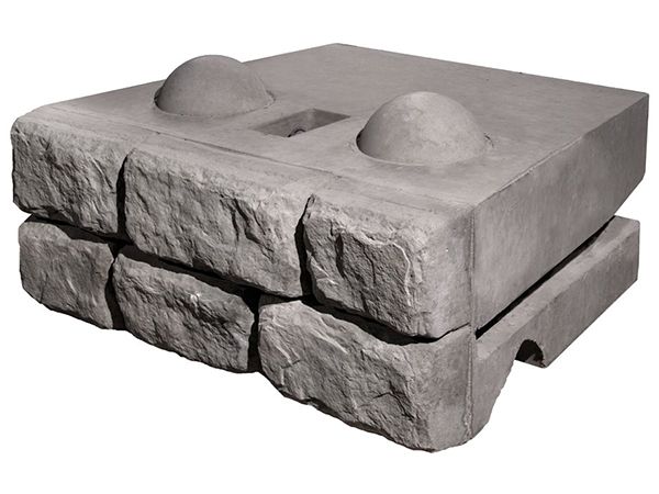 A stack of concrete blocks with a hole in the middle