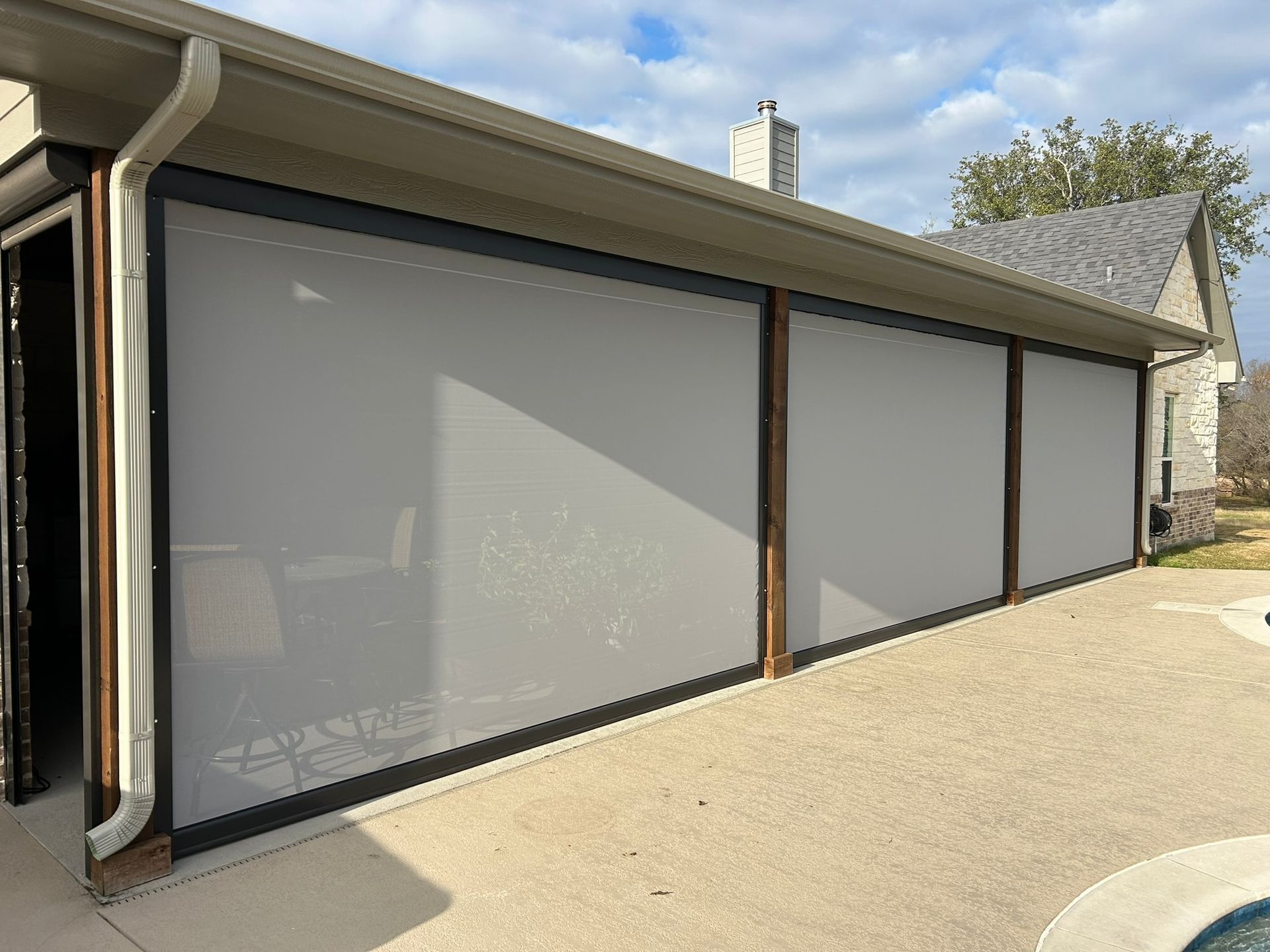 Exterior solar shades on a Sherman patio near Lake Texoma
