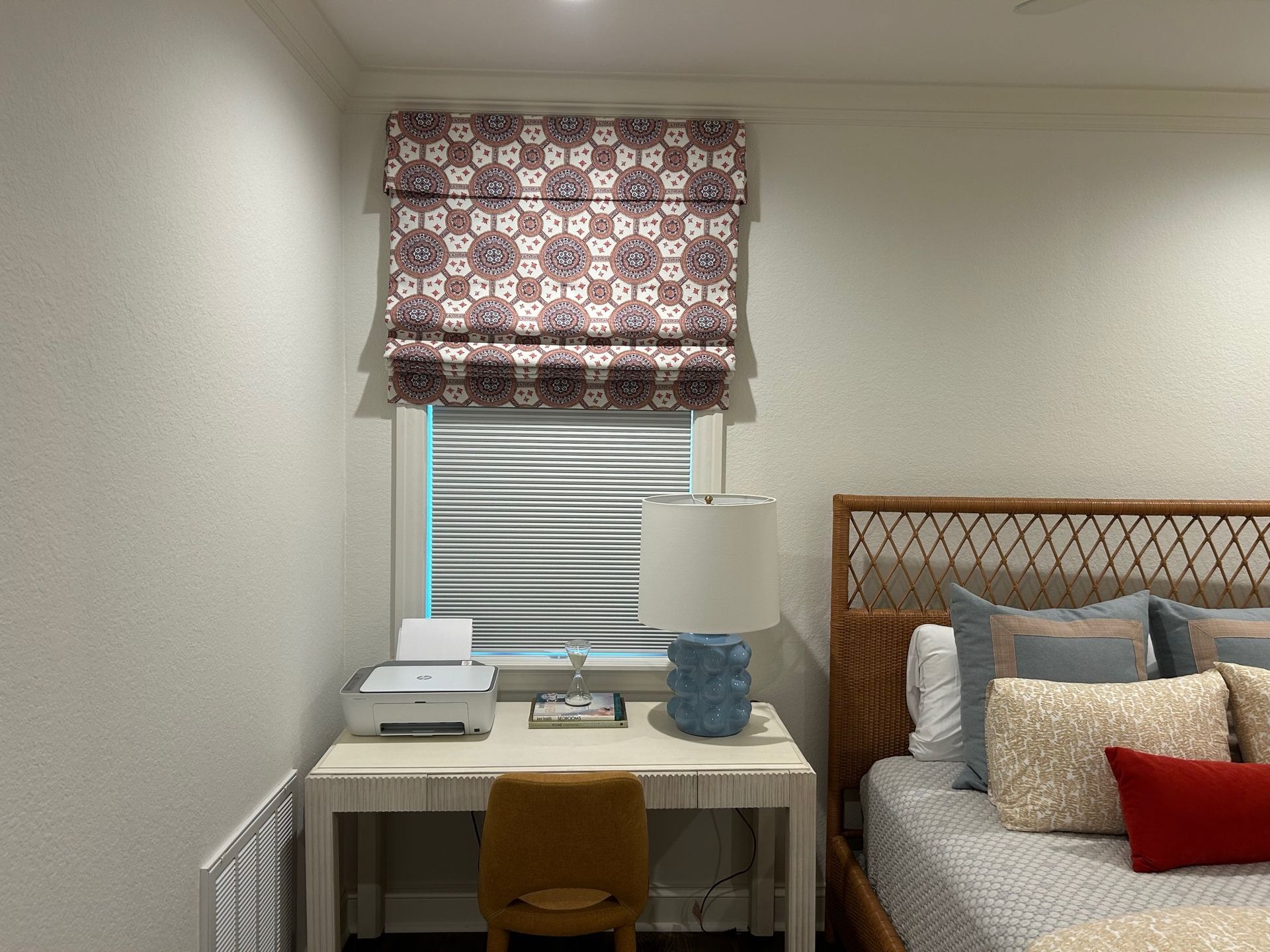 Custom roman shades in a Texas bedroom