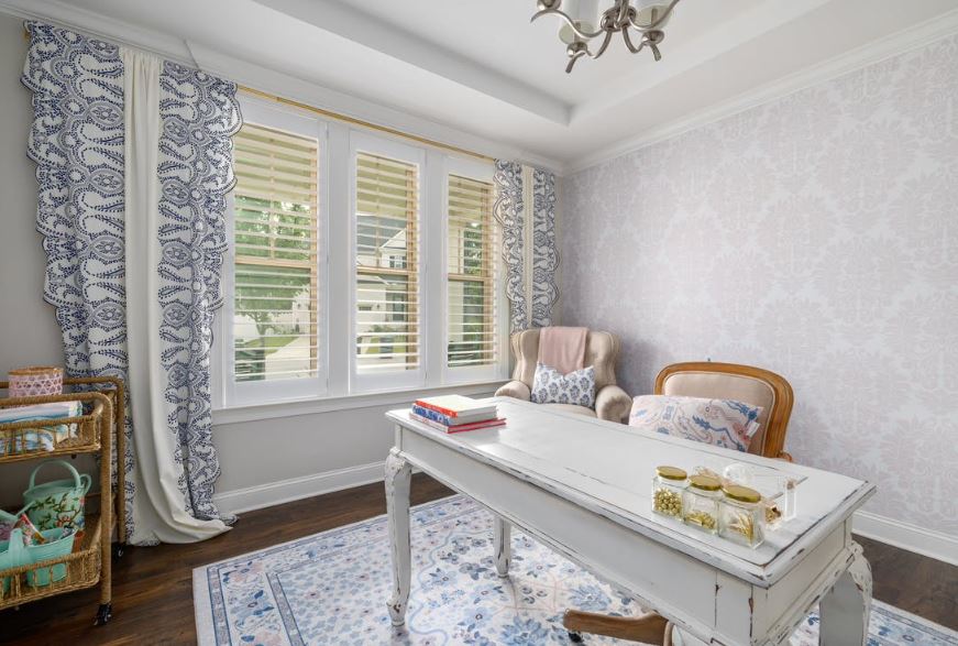 Custom window shades designed for a unique living room