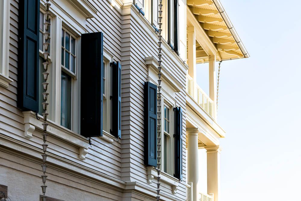 Do Exterior Window Treatments Help with Storms?