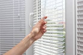 Love is Blinds-motorized patio shades in the poolroom 