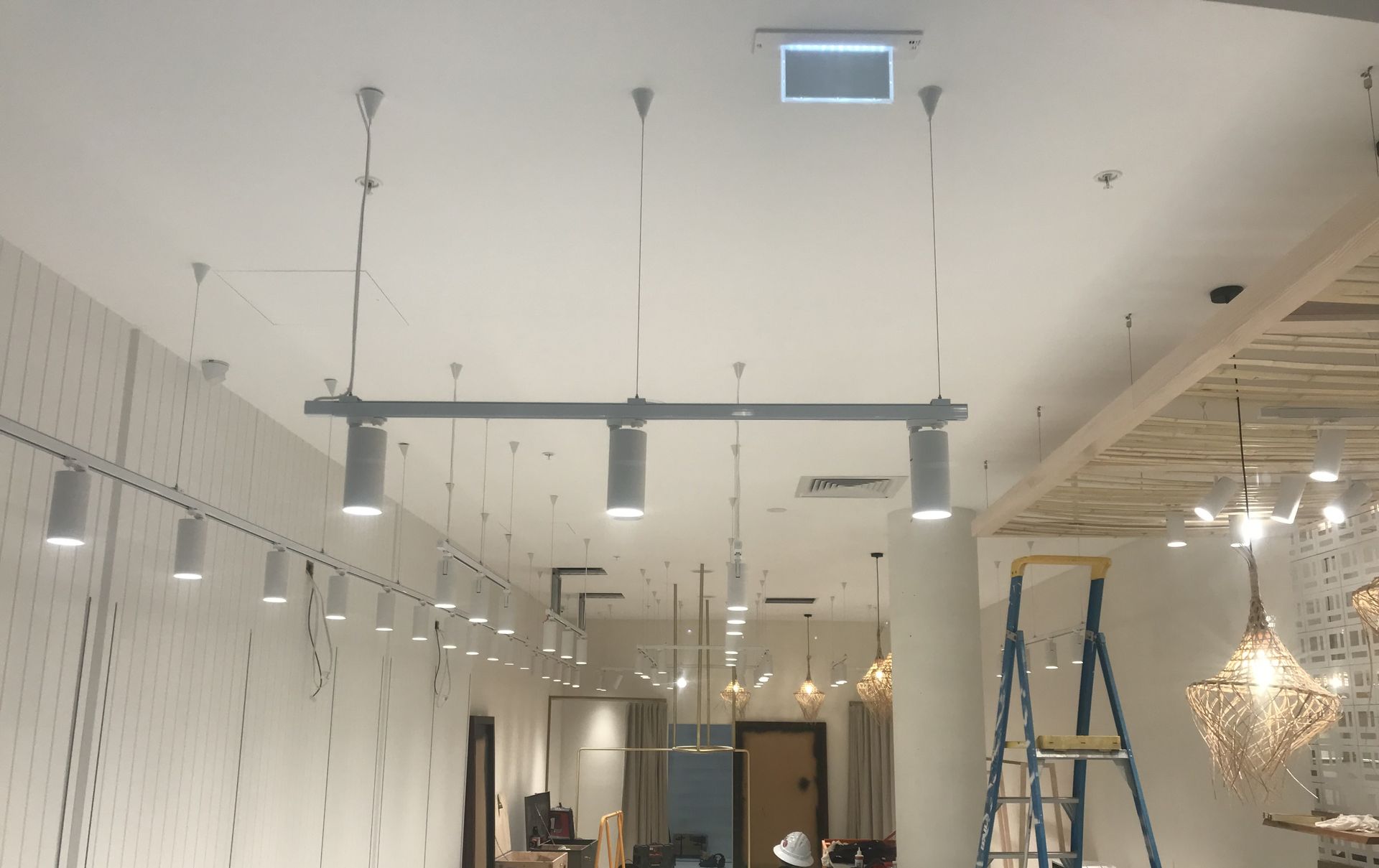 Lights are being installed in a lighting shop— Aliance Group in Bonville, NSW 