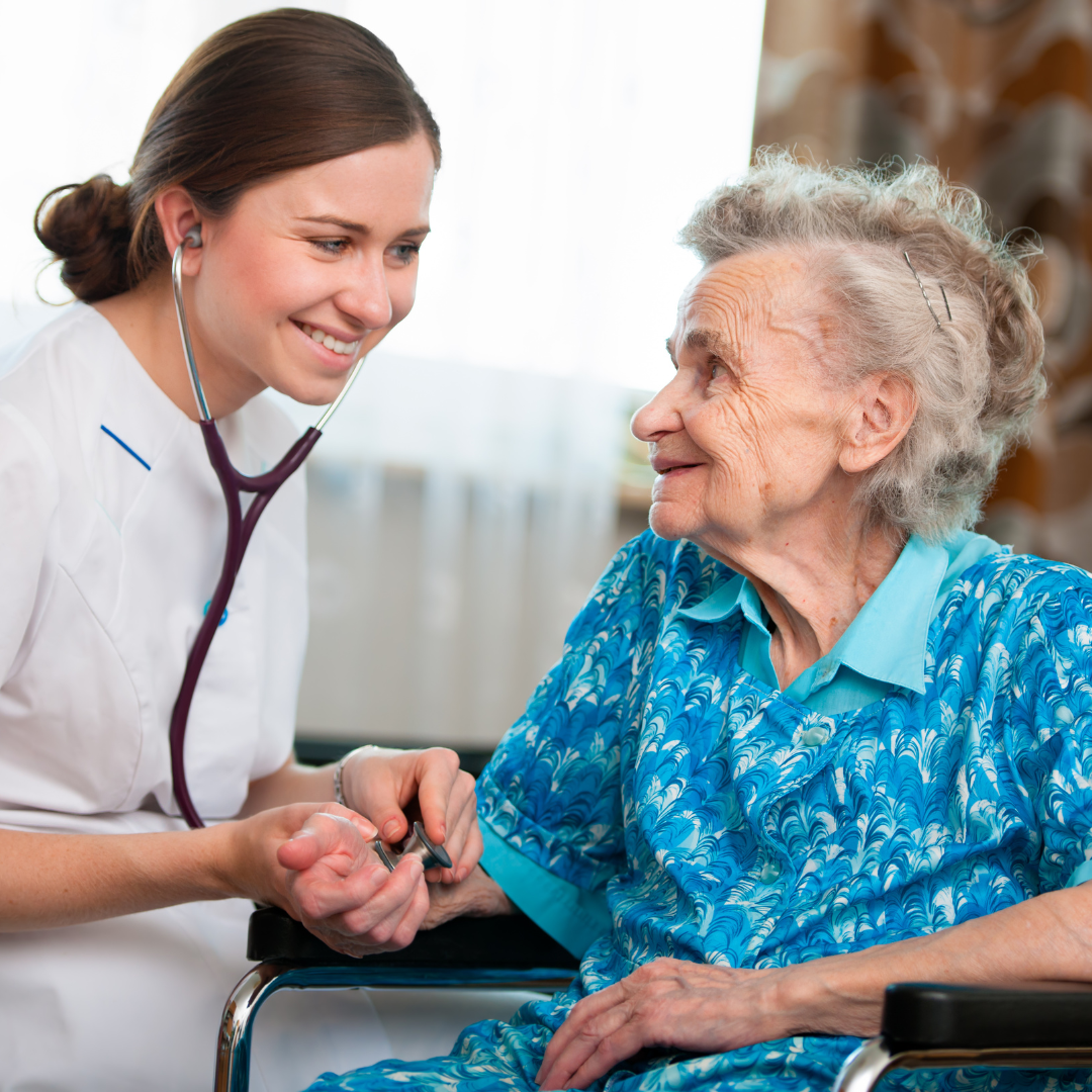 smiling caregiver with the elderly grandmother