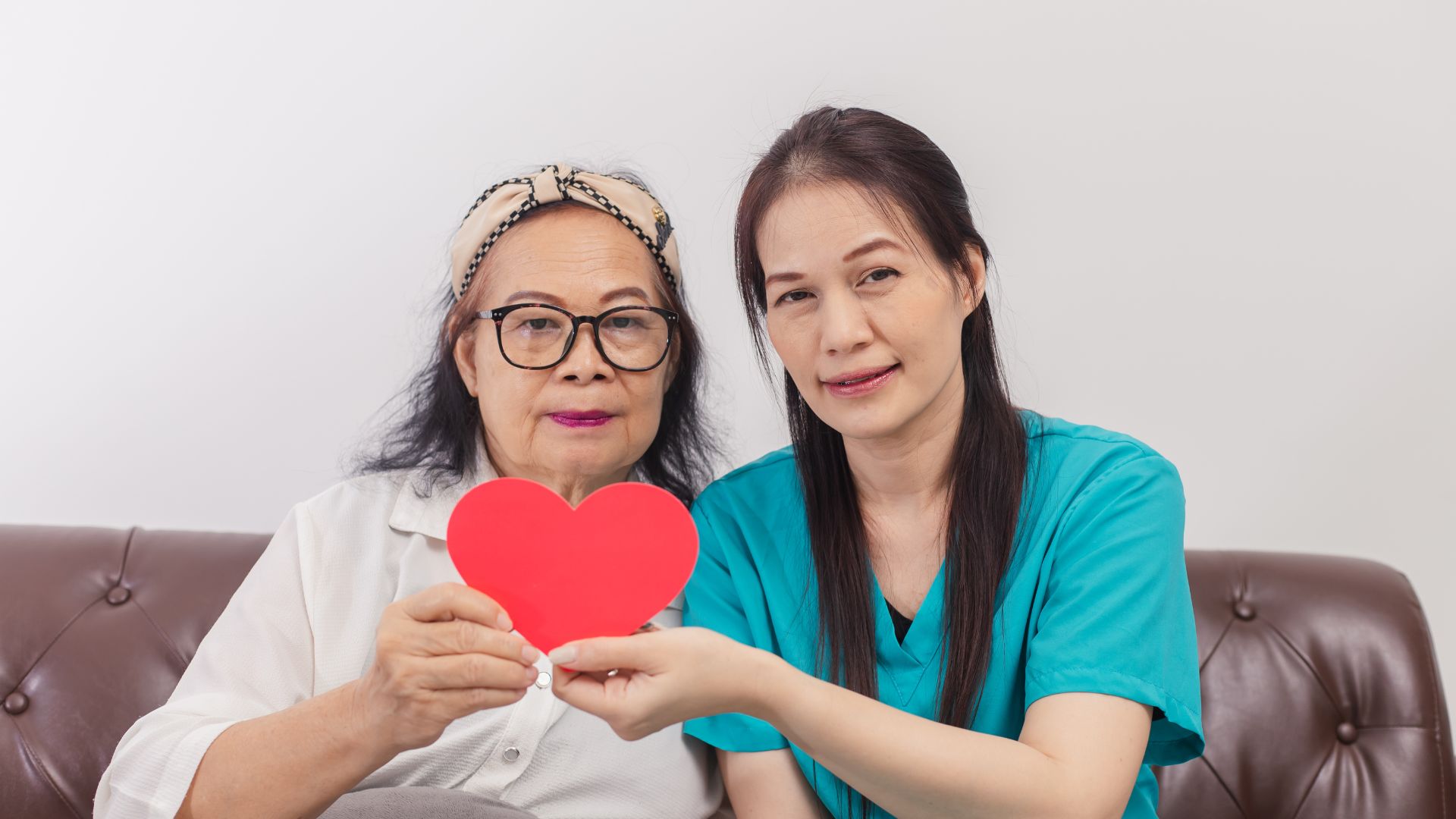 Health care concept. Caregiver taking care of senior patient.