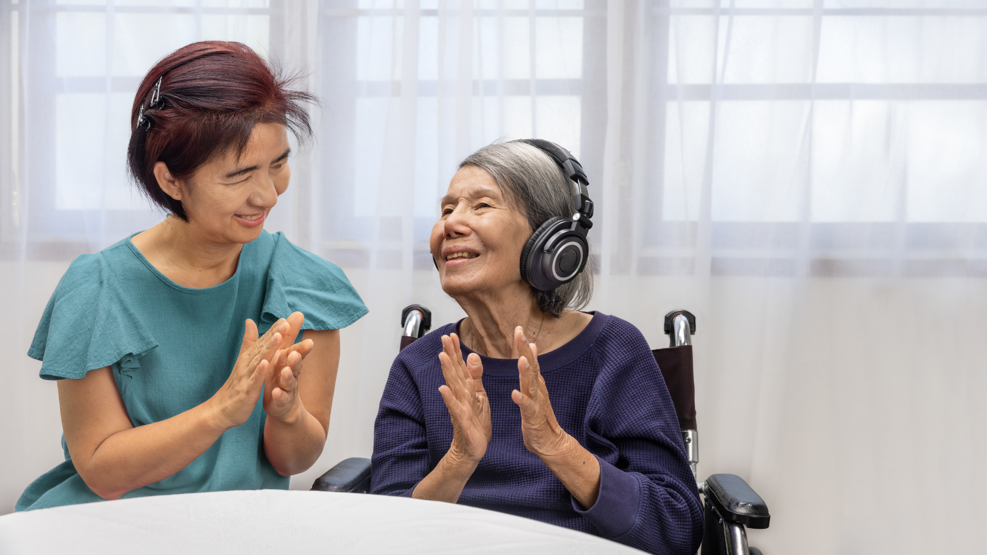 Music therapy in dementia treatment on anelderly woman.