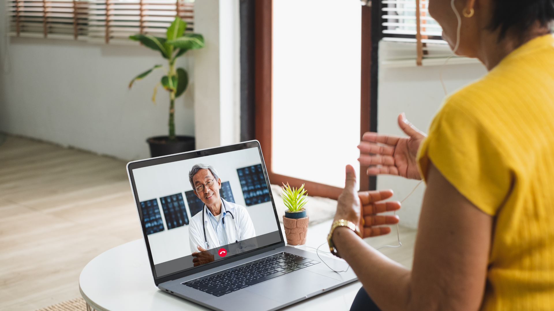 Asian senior video call with doctor telemedicine telehealth concept