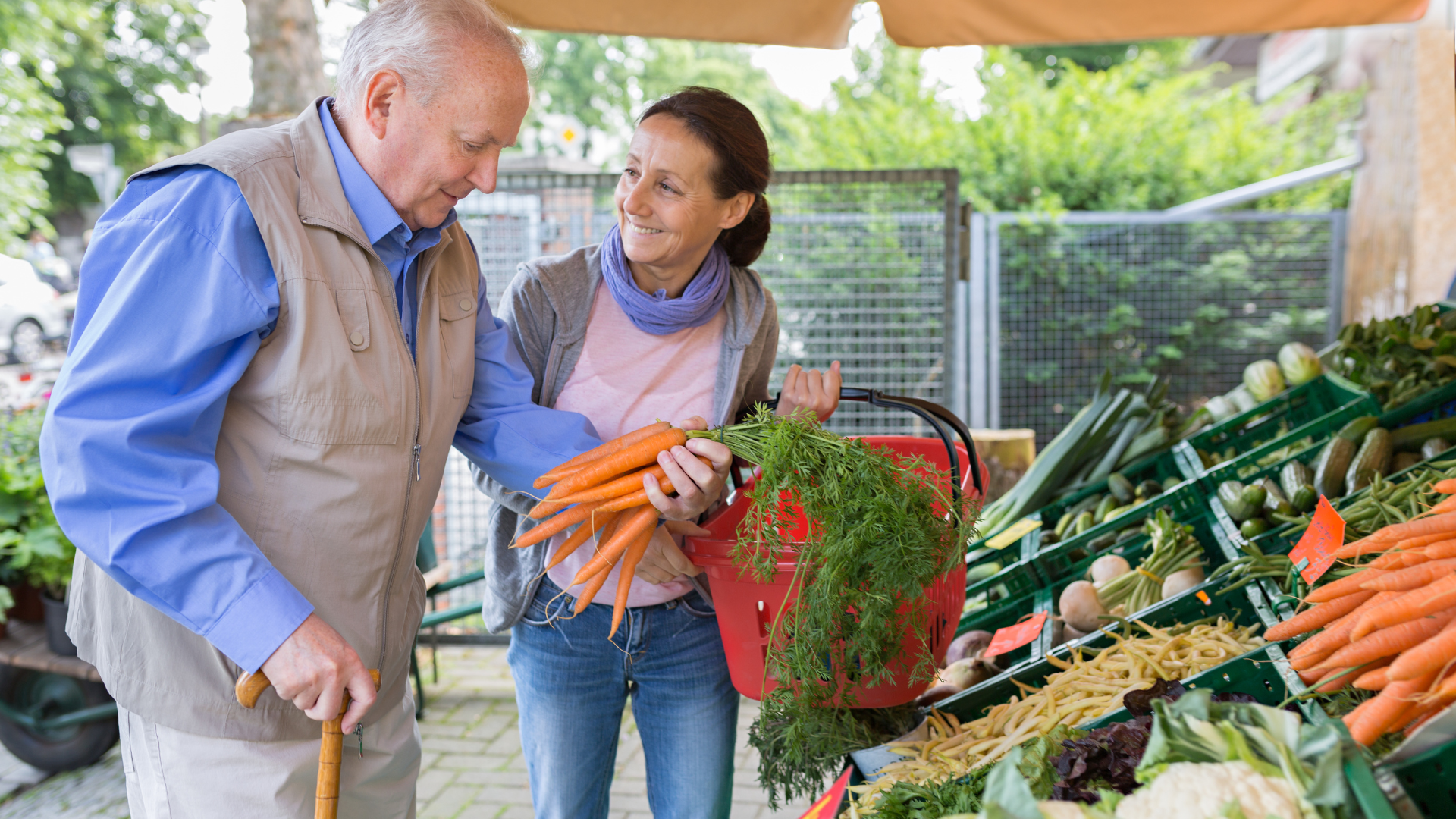 Assisted living - senior man with caregiver shopping