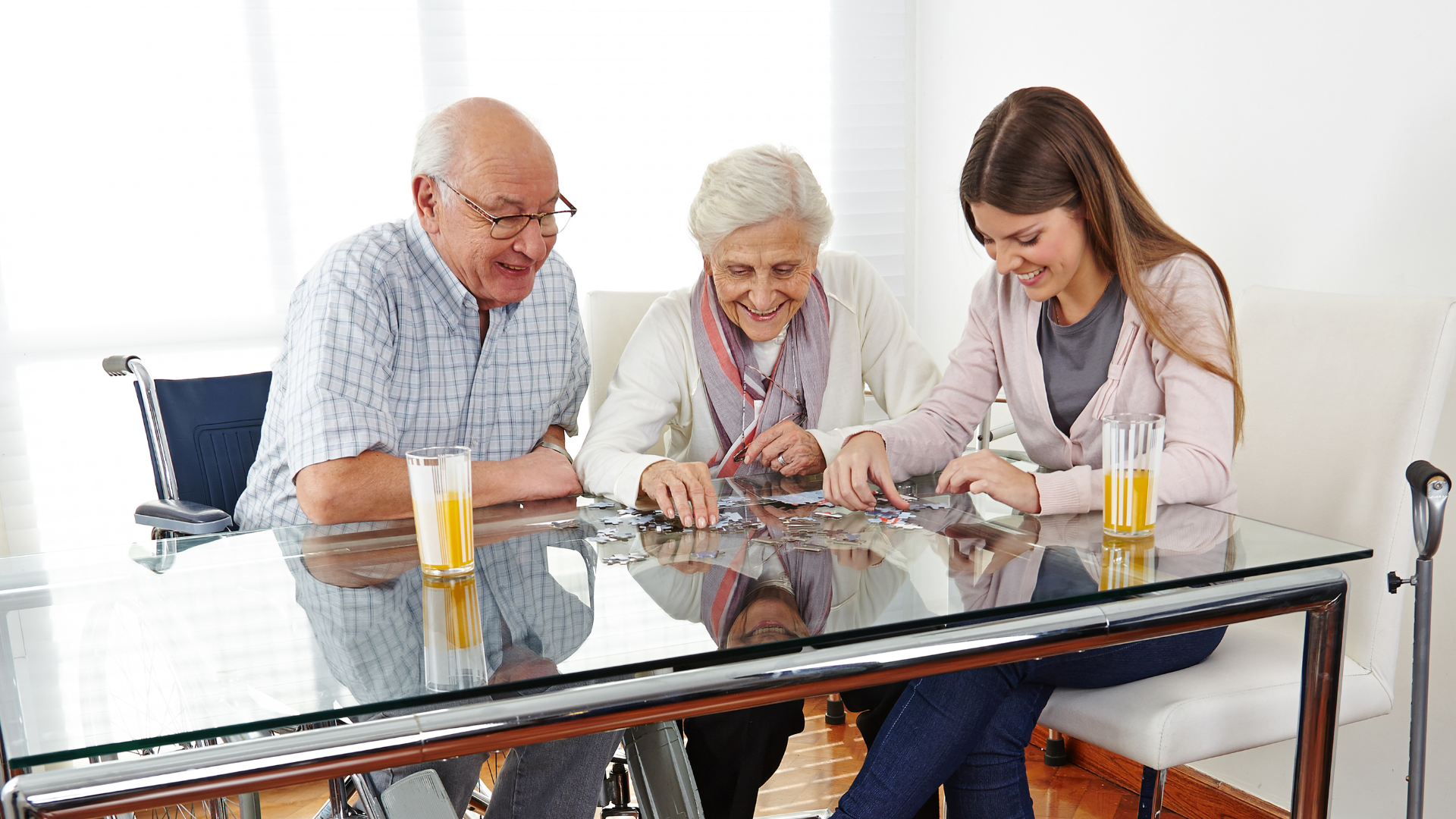 Family with Senior Couple Playing Jigsaw Puzzle