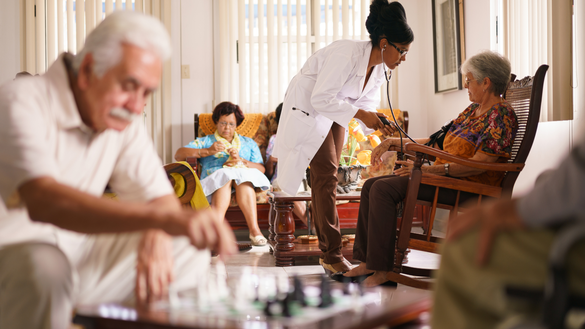 Hospice Doctor Measuring Blood Pressure