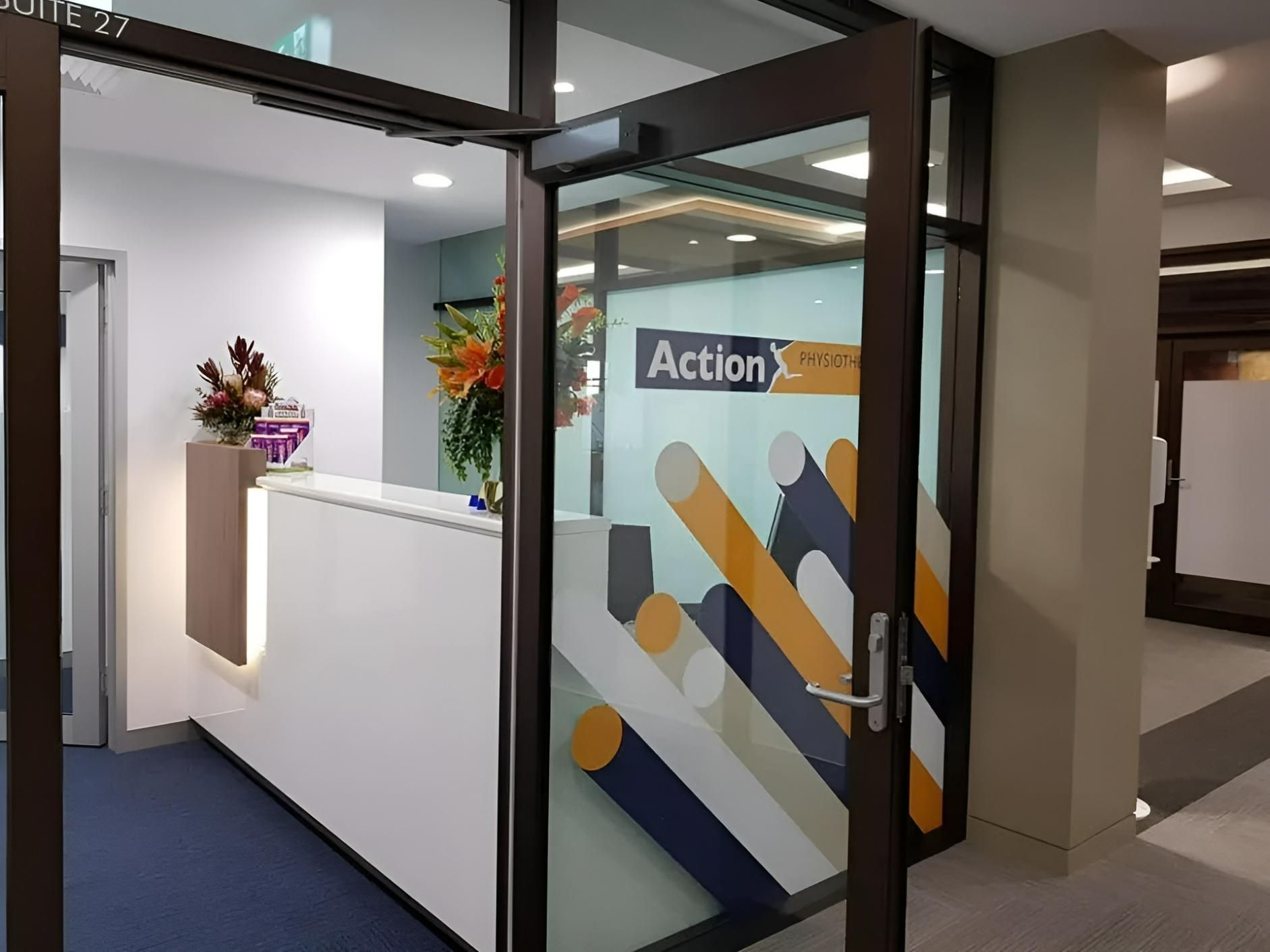 A Door with A Sign that Says Action on It — Action Physiotherapy in Cooks Hill, NSW
