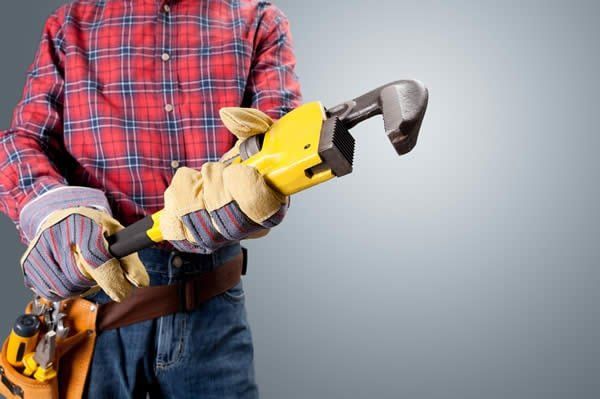Man With Wrench - Urbana, OH - Houser & Brinnon Plumbing & Heating