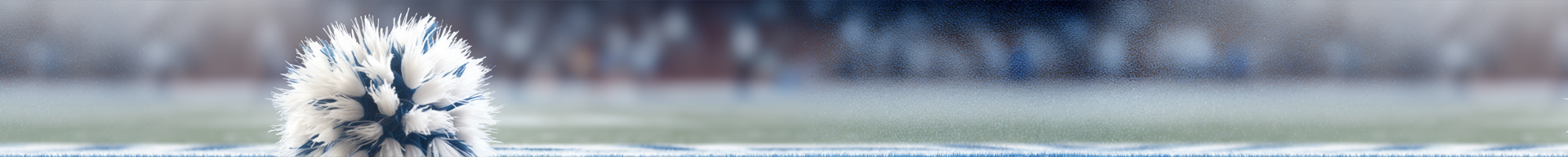 A blurry picture of a fountain with a blue background.