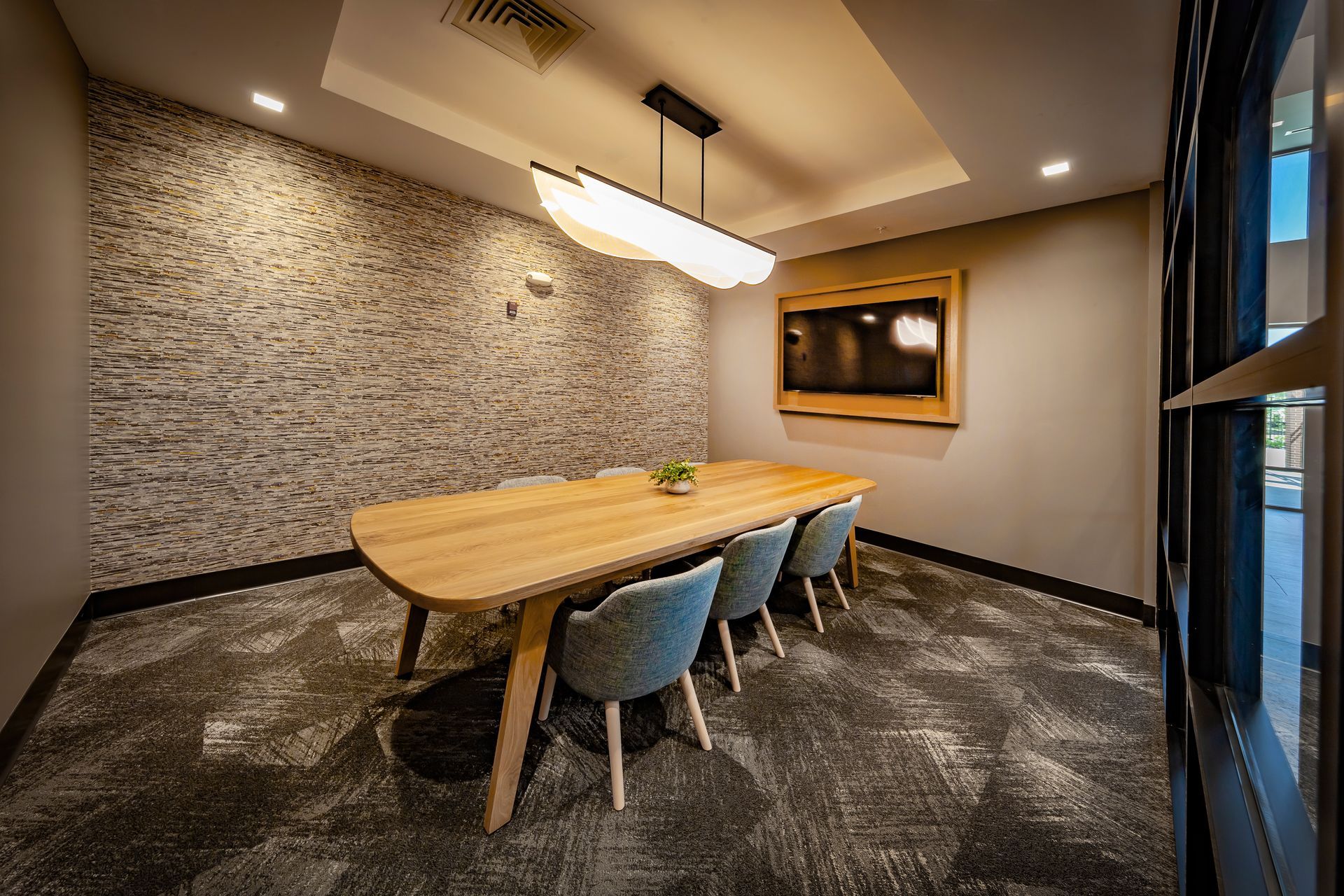 An artist 's impression of a hotel lobby with a large reception desk