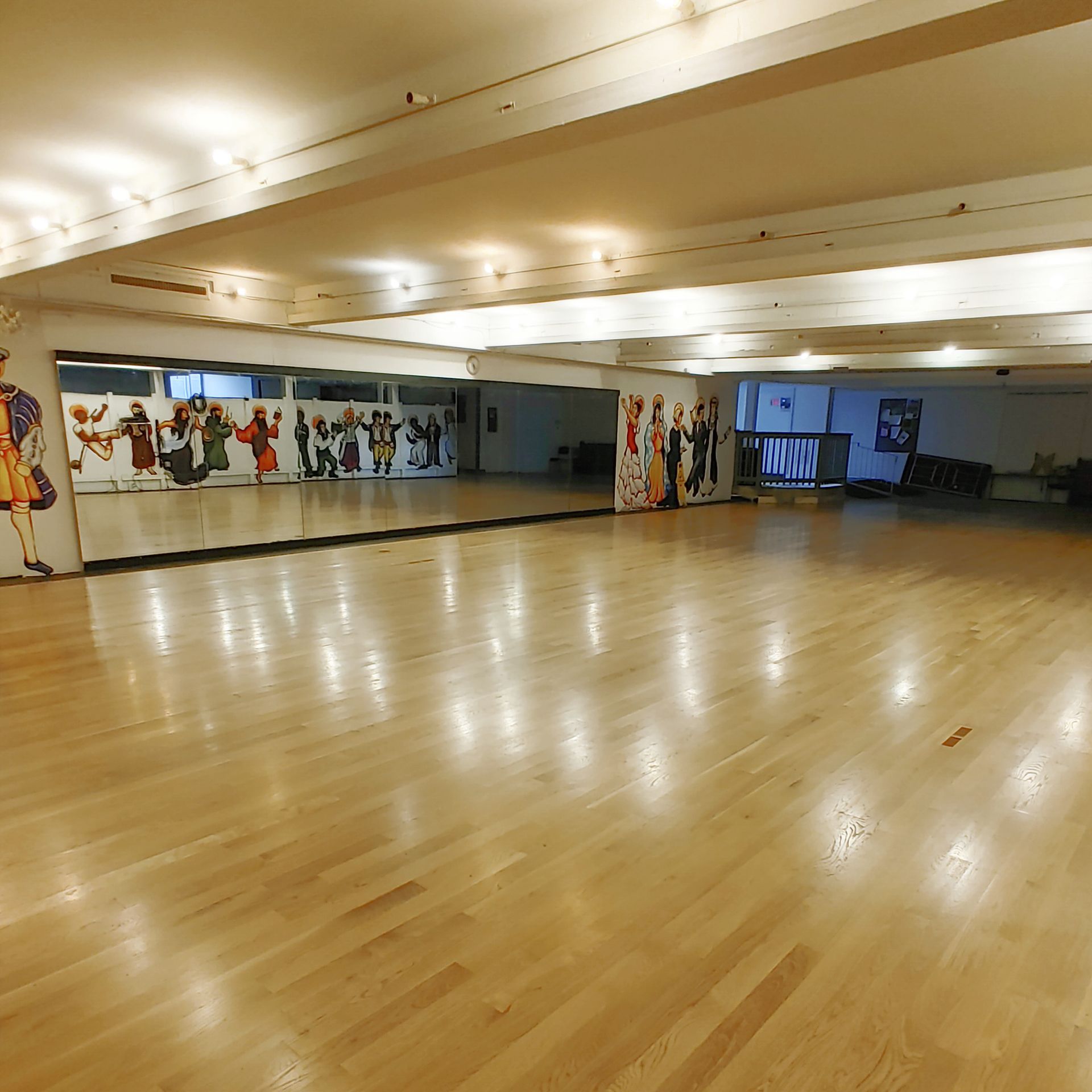 A woman is dancing on a poster for heels training beginner.
