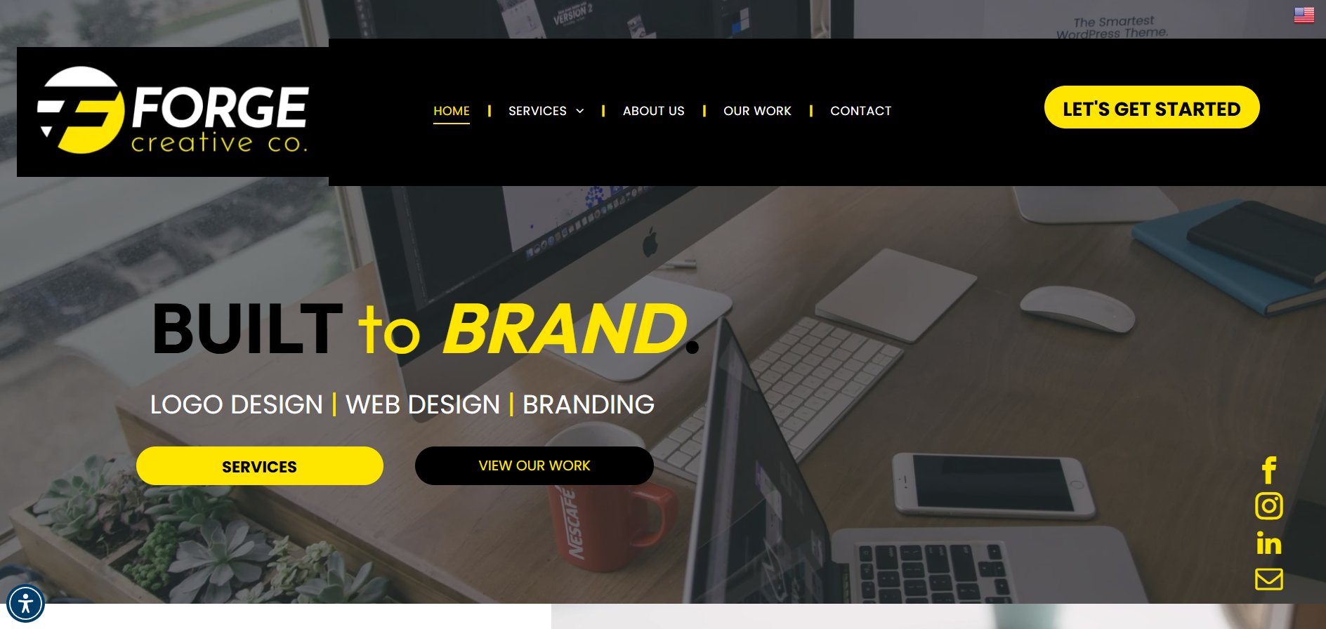 Forge Creative Co. website homepage featuring a top-down view of a desk with a laptop and phone.