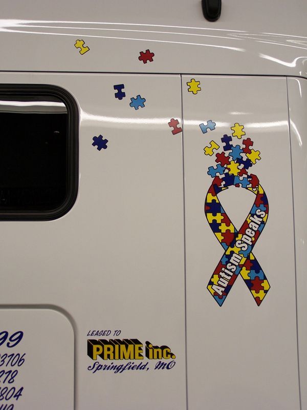 White Vehicle With Ribbon Puzzle Design — Springfield, MO — Stripes and Stuff Graphics