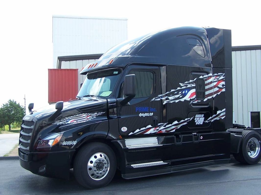 Black Prime Truck With Slashed US Flag — Springfield, MO — Stripes and Stuff Graphics