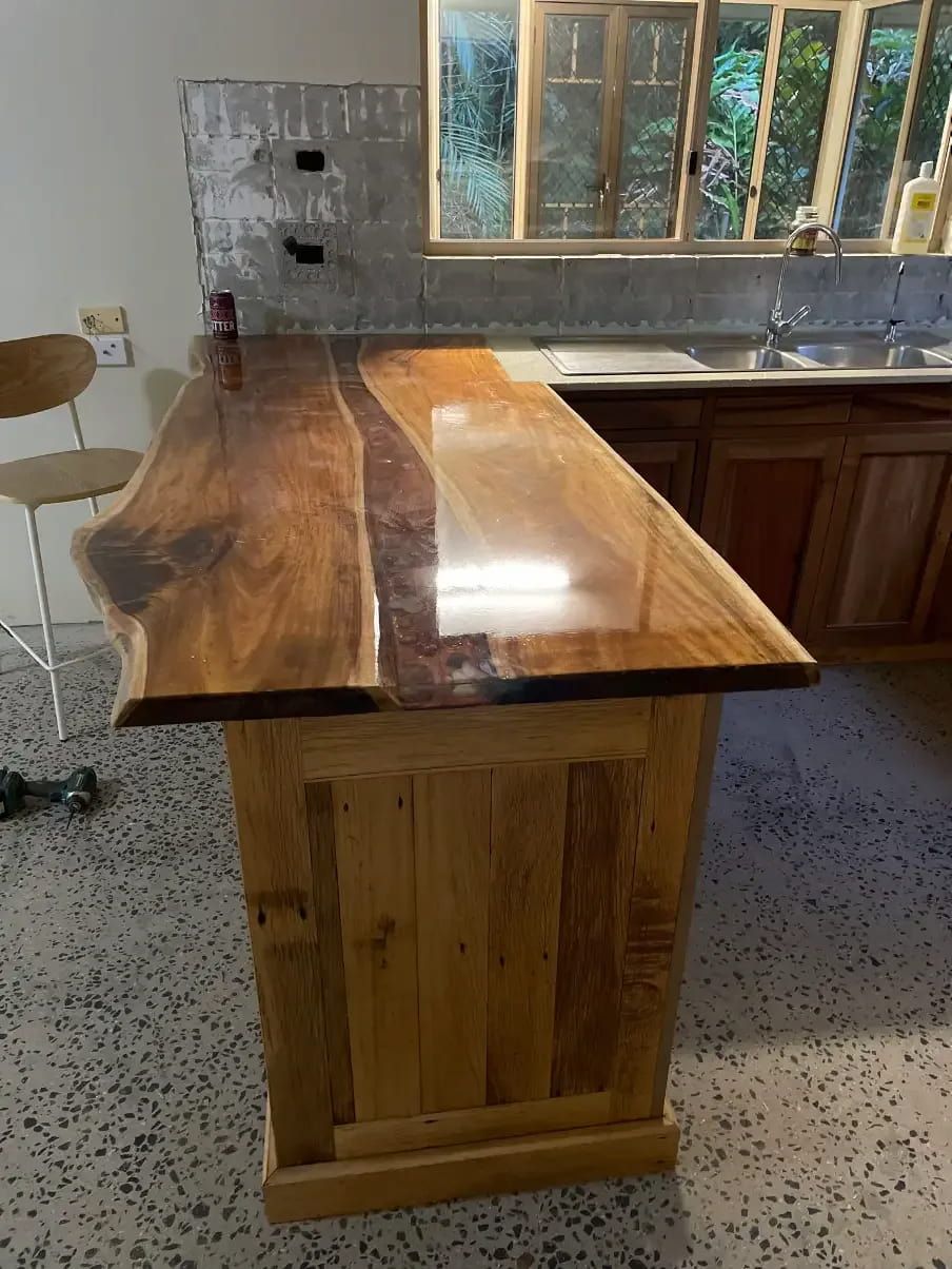 A Kitchen With a Wooden Counter Top and a Sink — Tim Thomas Carpentry in South Townsville, QLD