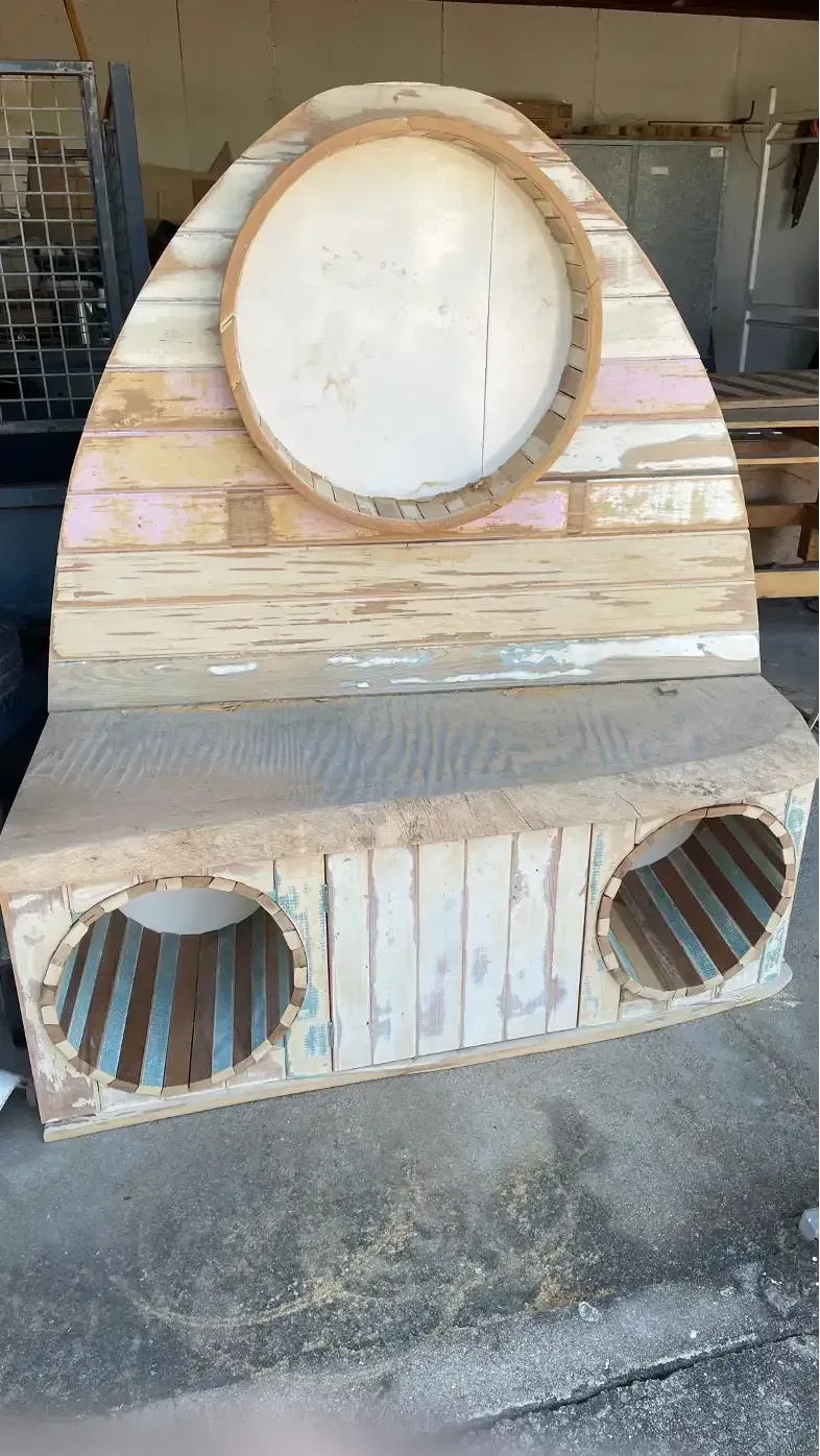 Wooden Bench With a Circular Mirror and Speaker Holes — Tim Thomas Carpentry in South Townsville, QLD