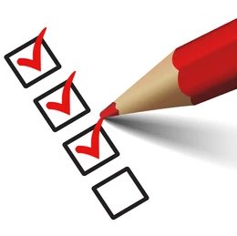 Green pencil checking off boxes on a checklist, with multiple boxes checked.