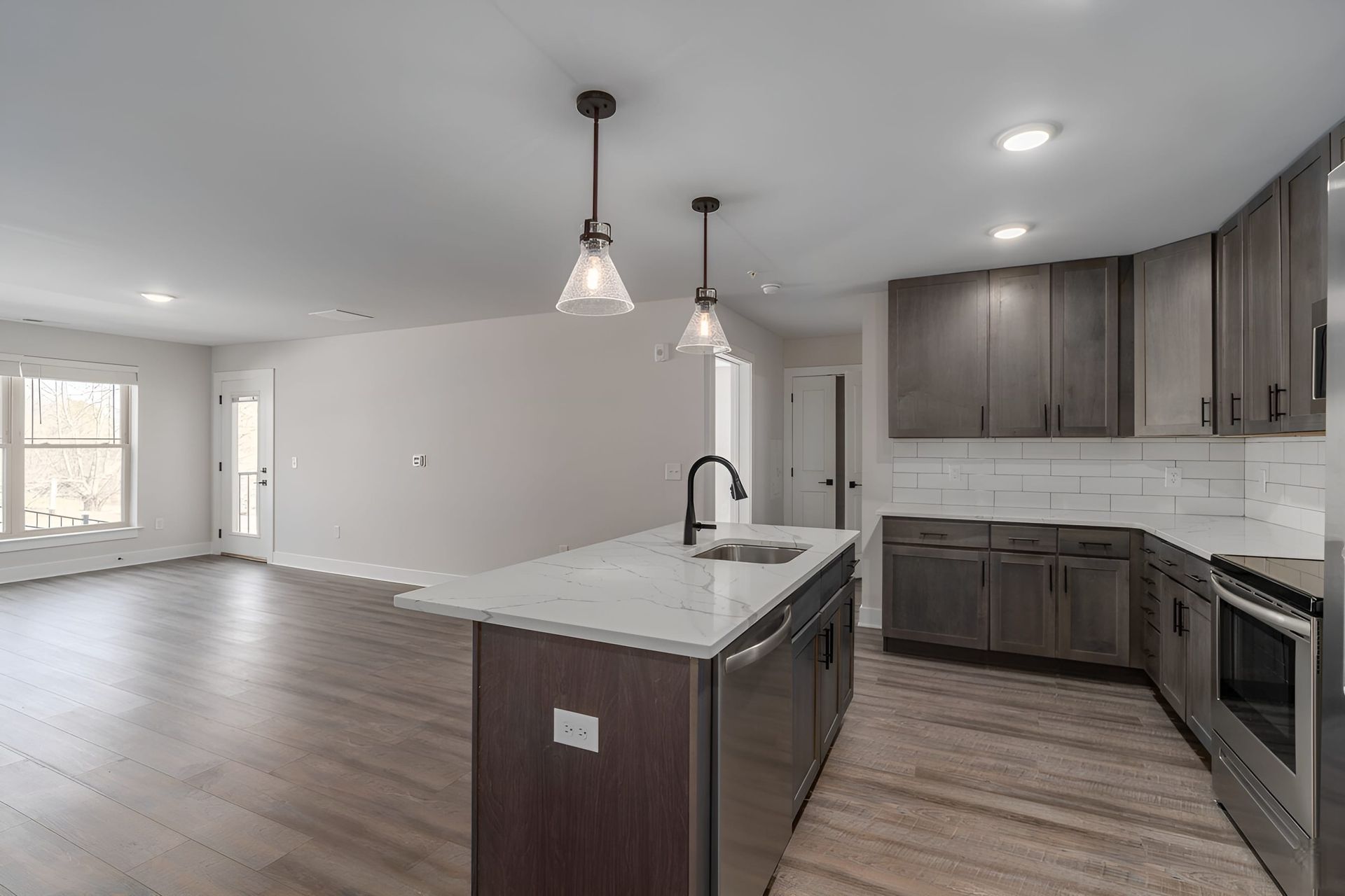 Elegant kitchen design in a one bedroom apartment for lease with large island