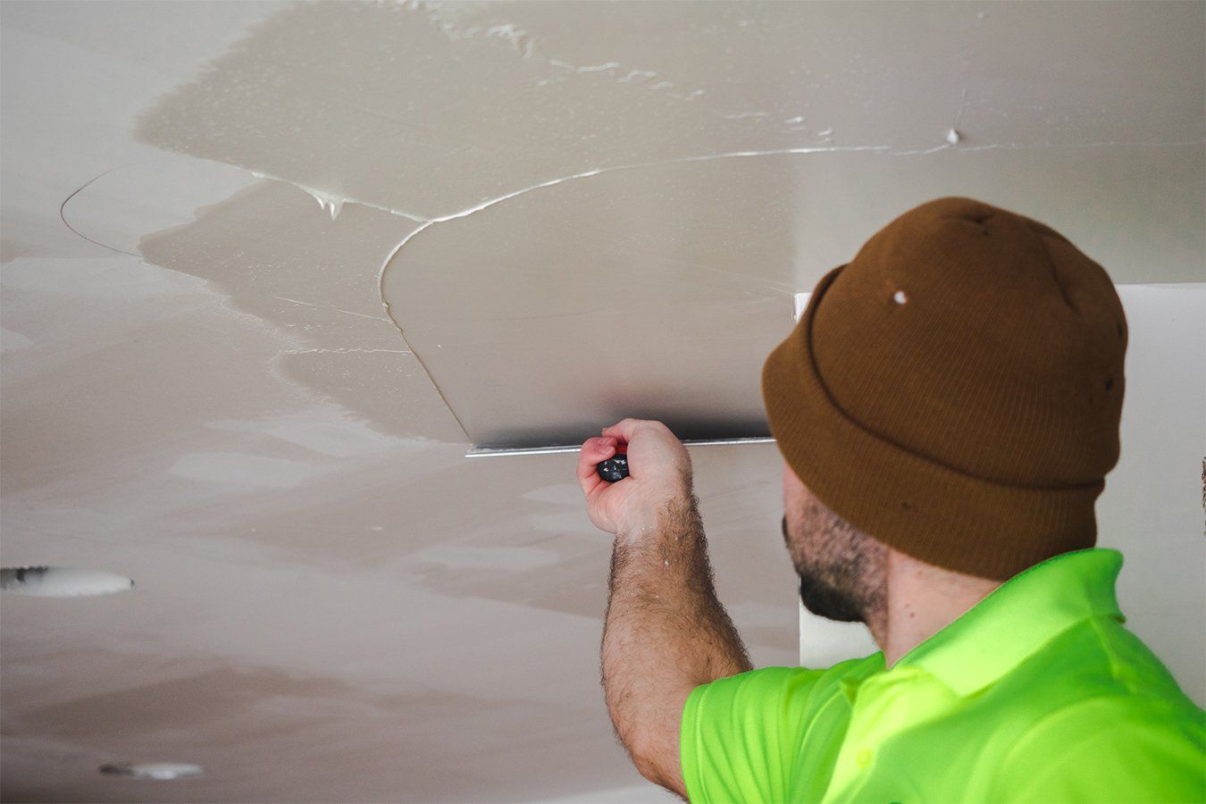 man with brown bonet