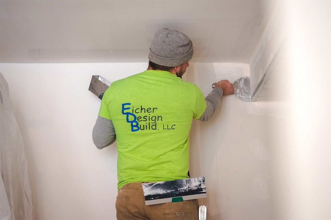 man painting the wall