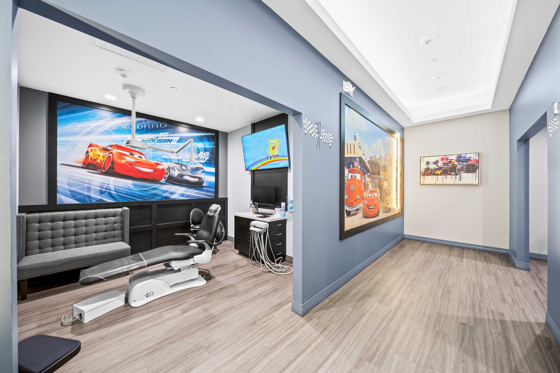 Grand Prix Dental in Katy, TXA dental office with a picture of lightning mcqueen on the wall.